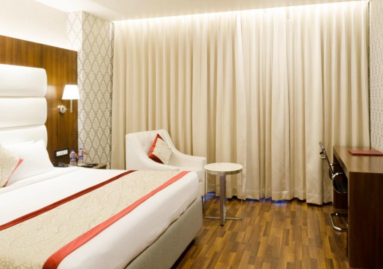 Ss Lumina Hotel Бенґалуру Екстер'єр фото